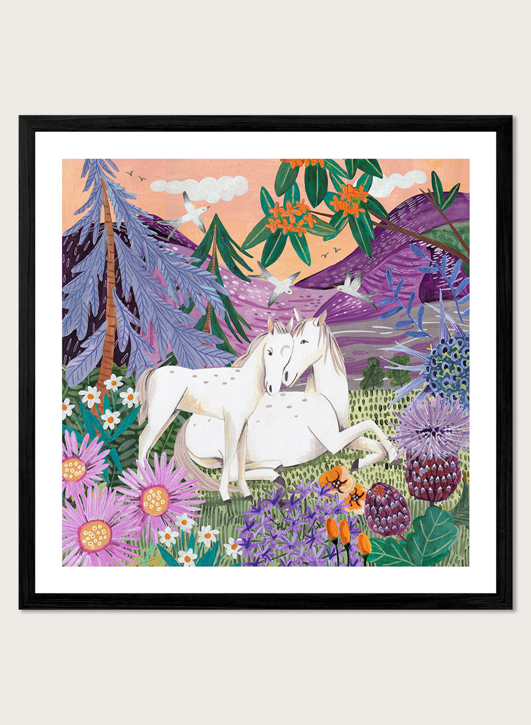 Framed artwork of two horses in a colorful forest scene with flowers and mountains. Horses in the Mountains by Caroline Bonne Müller is a fine art print and wall poster featuring two white horses surrounded by colorful flowers in a mountain landscape.