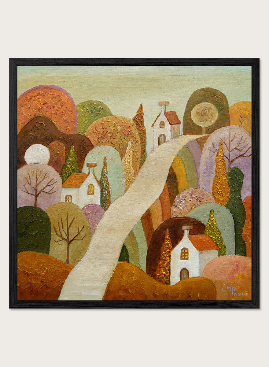 A framed landscape painting featuring stylized white houses, a winding cream path, and rolling hills in earthy tones of brown, orange, green, and purple. Shop Whimsical Village Path by Angeles M. Pomata, an autumn landscape art print featuring a winding road, white village houses, rounded hills, and warm earthy tones.