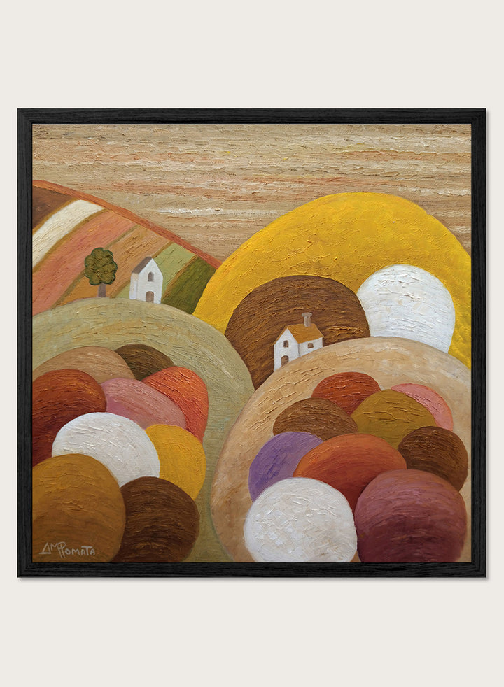 A framed abstract landscape painting featuring stylized hills, rolling forms, small houses, and a large yellow circular shape. Shop Colorful Hillside Village by Angeles M. Pomata, an autumn landscape art print featuring rounded hills, tiny white houses, earthy tones, and rich oil texture.