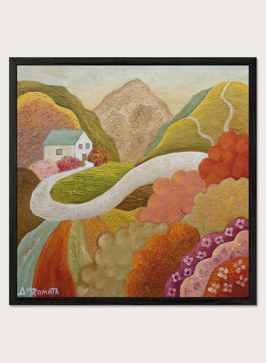 A framed landscape painting featuring a winding white road through colorful hills, a small white house, and a mountain in the background. Shop Colorful Hillside Home by Angeles M. Pomata, an autumn landscape art print featuring a winding road, white country house, rolling hills, and wildflowers.
