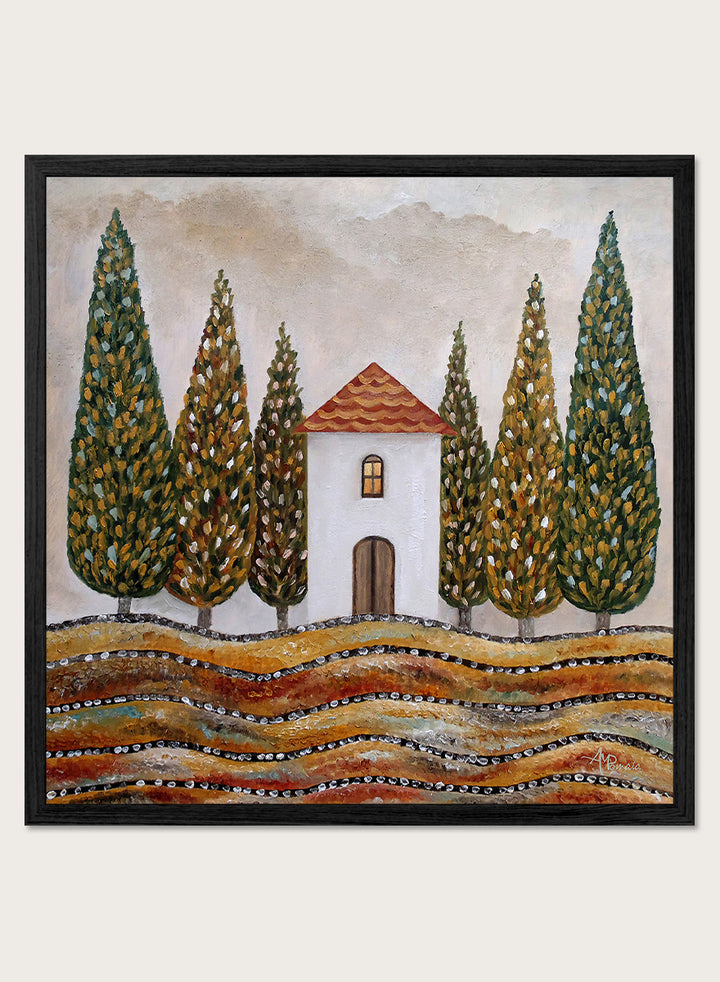 A framed landscape art print depicting a small white house with a red-tiled roof, surrounded by tall green cypress trees and wavy golden-brown hills. Shop Tuscan Cypress House by Angeles M. Pomata, an autumn landscape art print featuring a white country house, tall cypress trees, terracotta roof, and warm earthy tones.