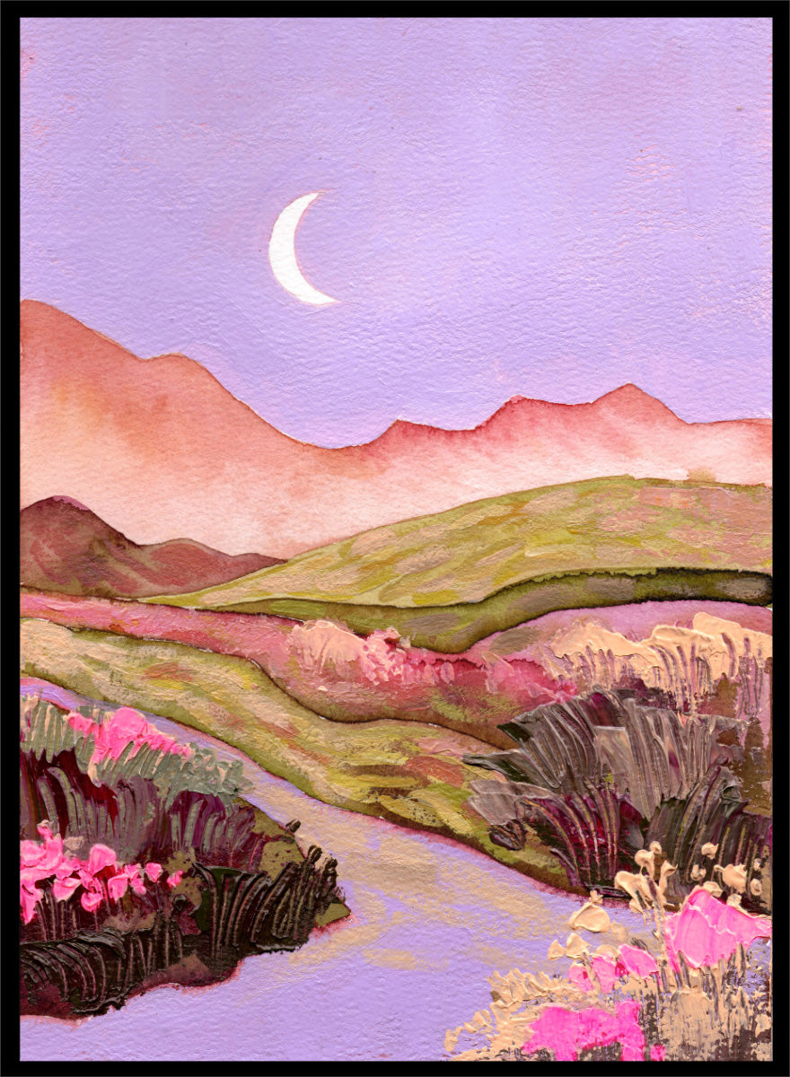A landscape painting featuring rolling green hills, pink mountains, a purple sky with a crescent moon, and pink flowers along a winding path. Shop Moonlit Valley Path by Ekaterina Prisich, a colorful landscape art print featuring a crescent moon, winding path, rolling hills, and wildflowers.