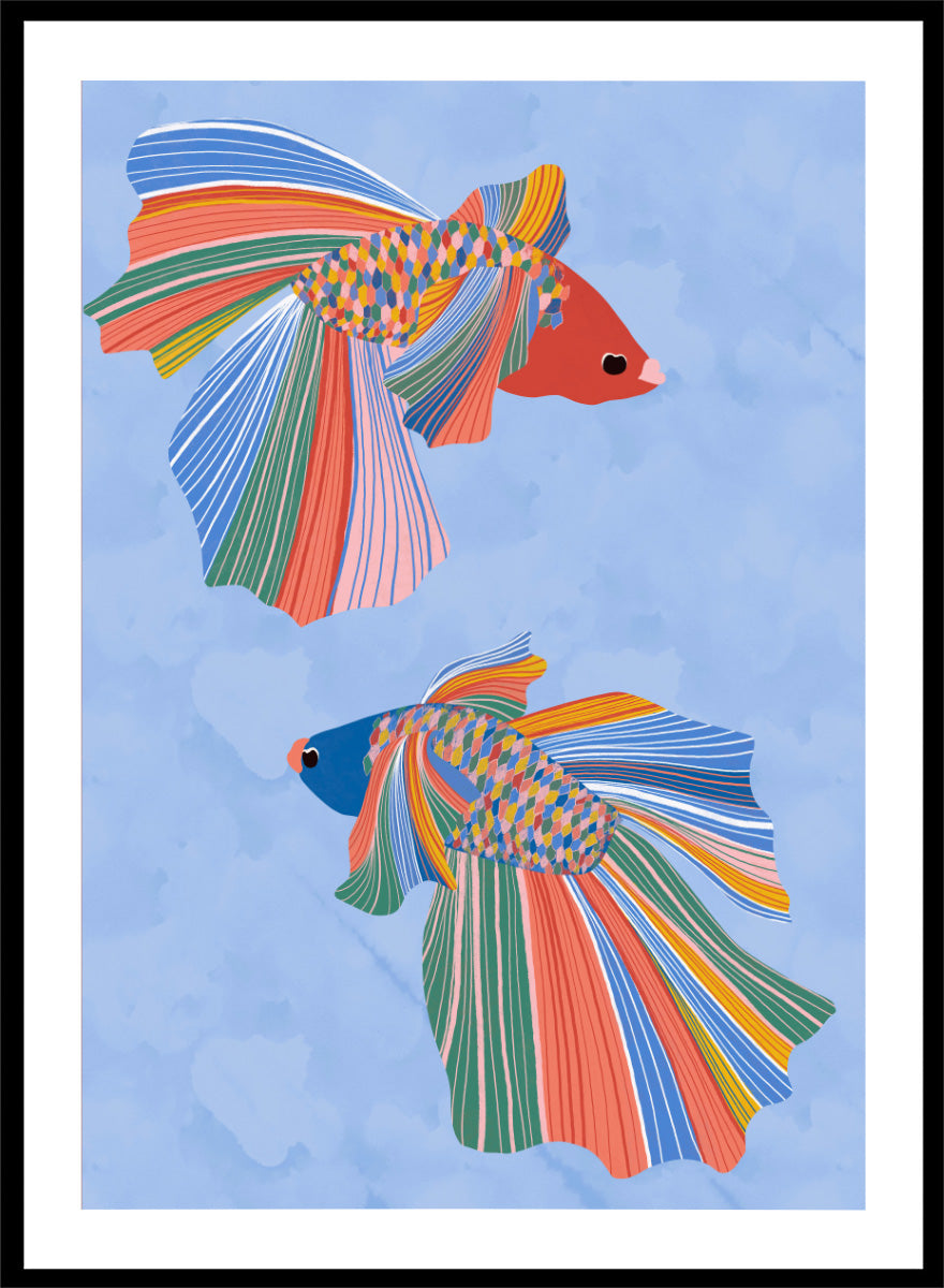 A framed art print featuring two stylized betta fish with vibrant, multicolored striped fins and bodies on a light blue water-like background. Colorful Betta Duo by Ceyda Alasar fish art print featuring two patterned betta fish with flowing fins in bright coral, blue, green, pink, and yellow.