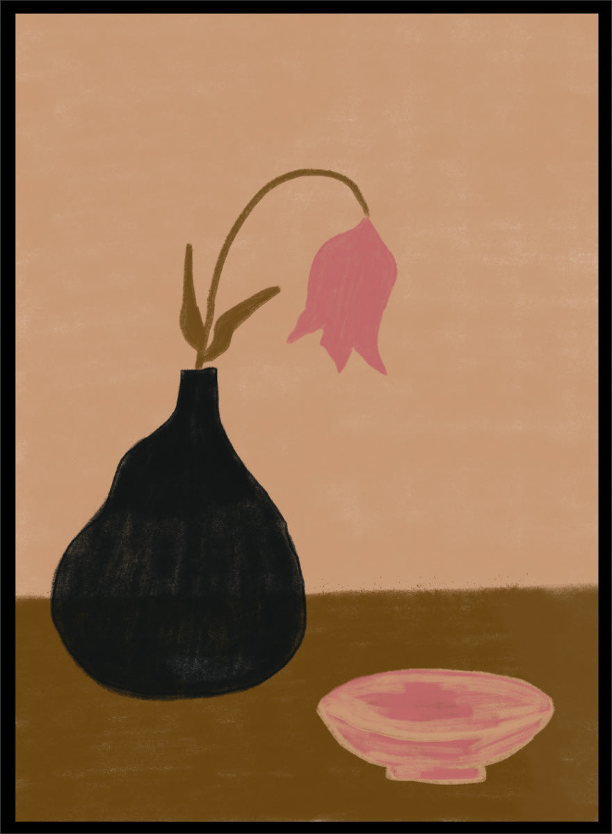 A minimalist still life painting featuring a black pear-shaped vase with a single drooping pink flower, alongside a pink bowl, set against a warm beige background and a brown tabletop. Minimal Pink Still Life by The Art Concept still life art print featuring a black vase, drooping pink flower, small bowl, and warm earthy tones.