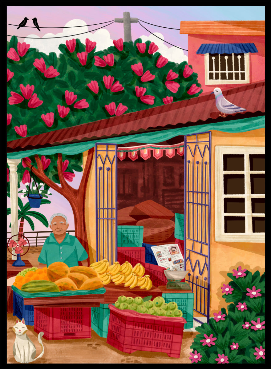 A colorful illustrated street market scene with a vendor standing behind tables of fruit and vegetables, a flowering tree, a house with pink flowers, crates, a pigeon on the roof, birds in the sky, and a white cat in the lower left. Colorful fruit stand art print by Nidhi Kachhadiya with fresh produce, floral details, and market charm. A cheerful print for kitchen or dining spaces.