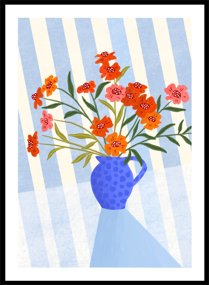 A framed art print featuring a stylized illustration of a blue patterned pitcher vase filled with orange, red, and pink flowers against a blue and white striped background. Cheerful Floral Pitcher by Bea Müller floral still life art print featuring orange and pink flowers in a bright blue jug with striped blue decor.