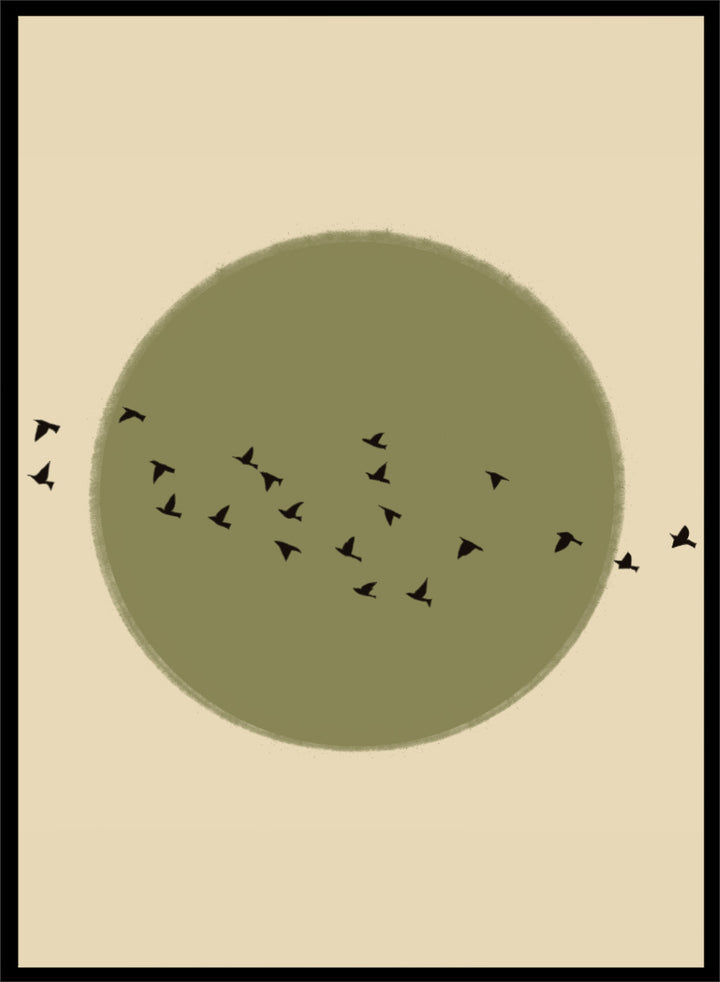 Minimalist art print featuring a large olive green circle with small black bird silhouettes flying across it, set against a warm beige background. Graceful Birds Soaring by The Art Concept is a minimalist bird art print featuring black birds in flight across an olive green circle and warm cream background.