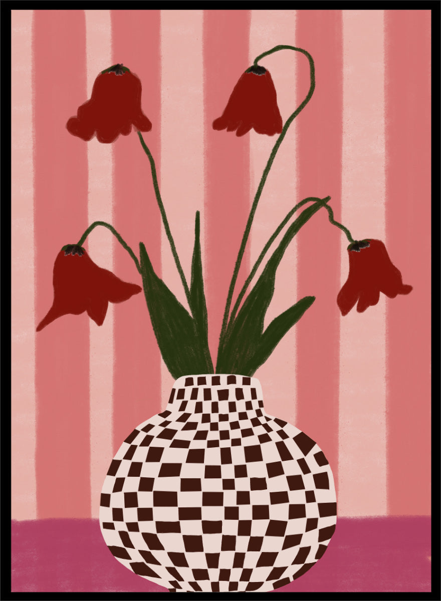 A stylized floral artwork showing four dark red bell-shaped flowers with long green stems rising from a black-and-white checkerboard vase, set against pink vertical stripes and a pink base. Whimsical Flowers Checkered Vase by The Art Concept still life art print featuring red flowers, a checkered vase, and a soft pink striped background.