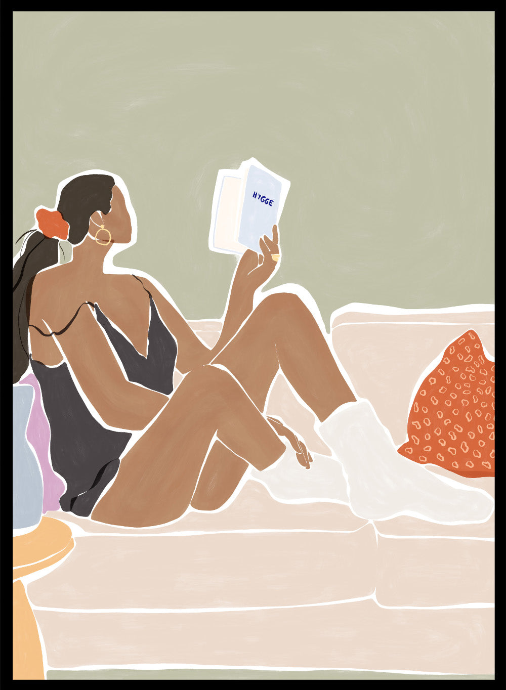 Woman Enjoying a Great Hygge Book by Ivy Green is a cozy modern figure art print celebrating slow living and self-care. Premium fine art print with optional wood framing.