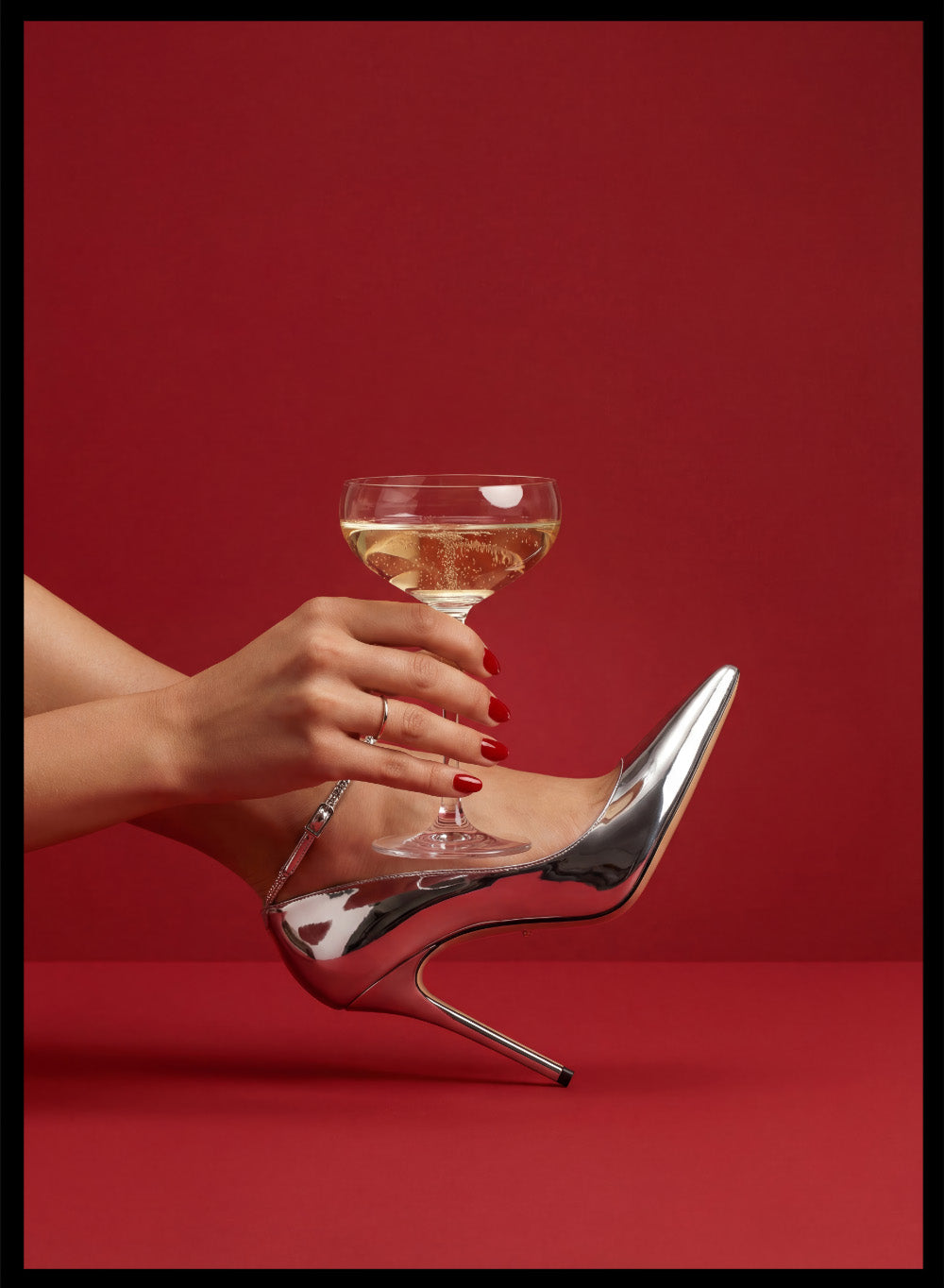 High-heeled shoe holding a glass of white wine against a red background, High Heels and Champagne by Andreas Magnusson is a fashion illustration art print featuring high heels, champagne glass imagery, bold red tones, and modern contemporary wall art style.