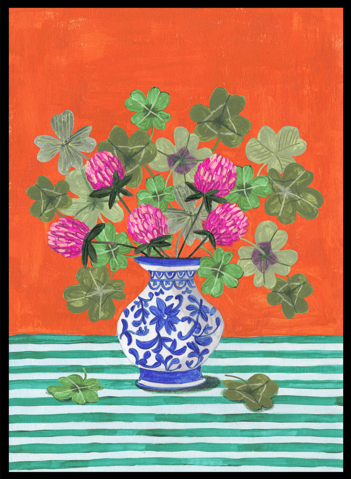 Vase with pink flowers and green leaves on a red and green striped background. Vibrant Clover Still Life by Caroline Bonne Müller is a fine art print and wall poster featuring clover leaves, pink flowers, and a blue vase on a striped table.