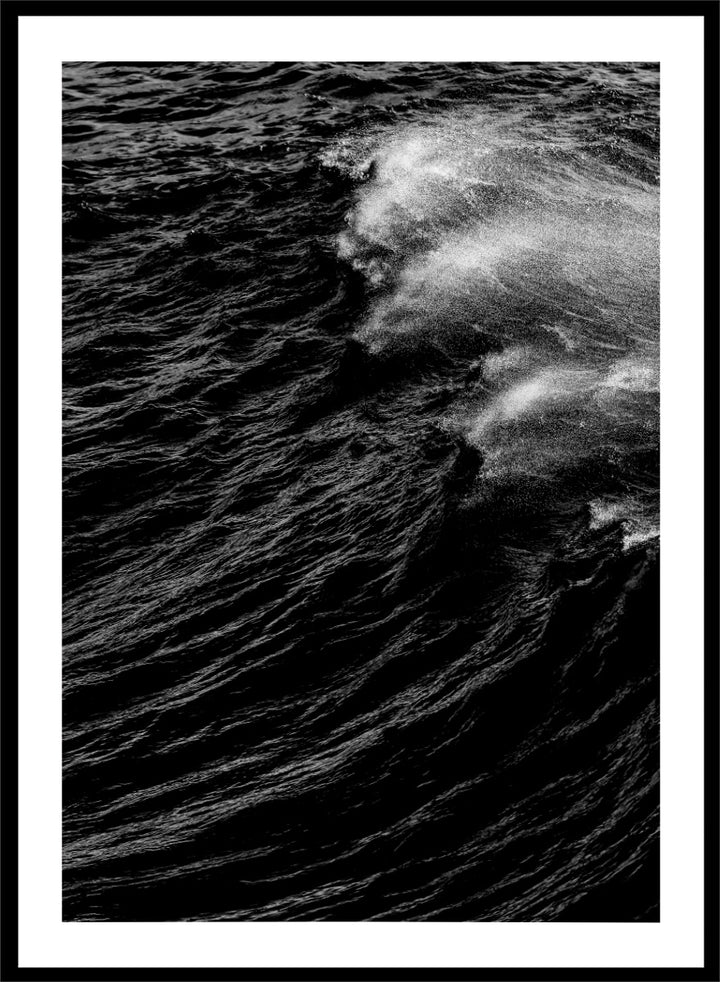 Black and white fine art photographic print of a crashing ocean wave. Dark Wave Symphony by Shot by Clint black-and-white ocean photography print featuring breaking waves, sea spray, and dramatic water texture.