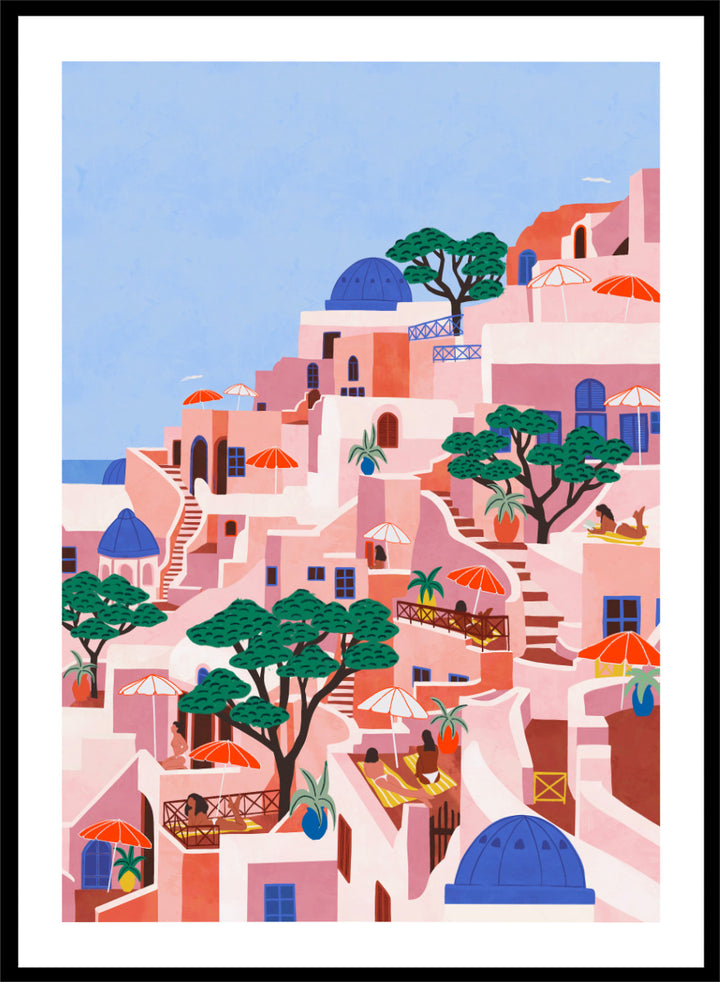 A stylized art print depicting a hillside Mediterranean village with pink and peach buildings, blue domes, green trees, and a light blue sky. Santorini Summer Dream by Ceyda Alasar art print featuring blue domes, terraced Mediterranean architecture, orange umbrellas, and sunny Greek island charm.