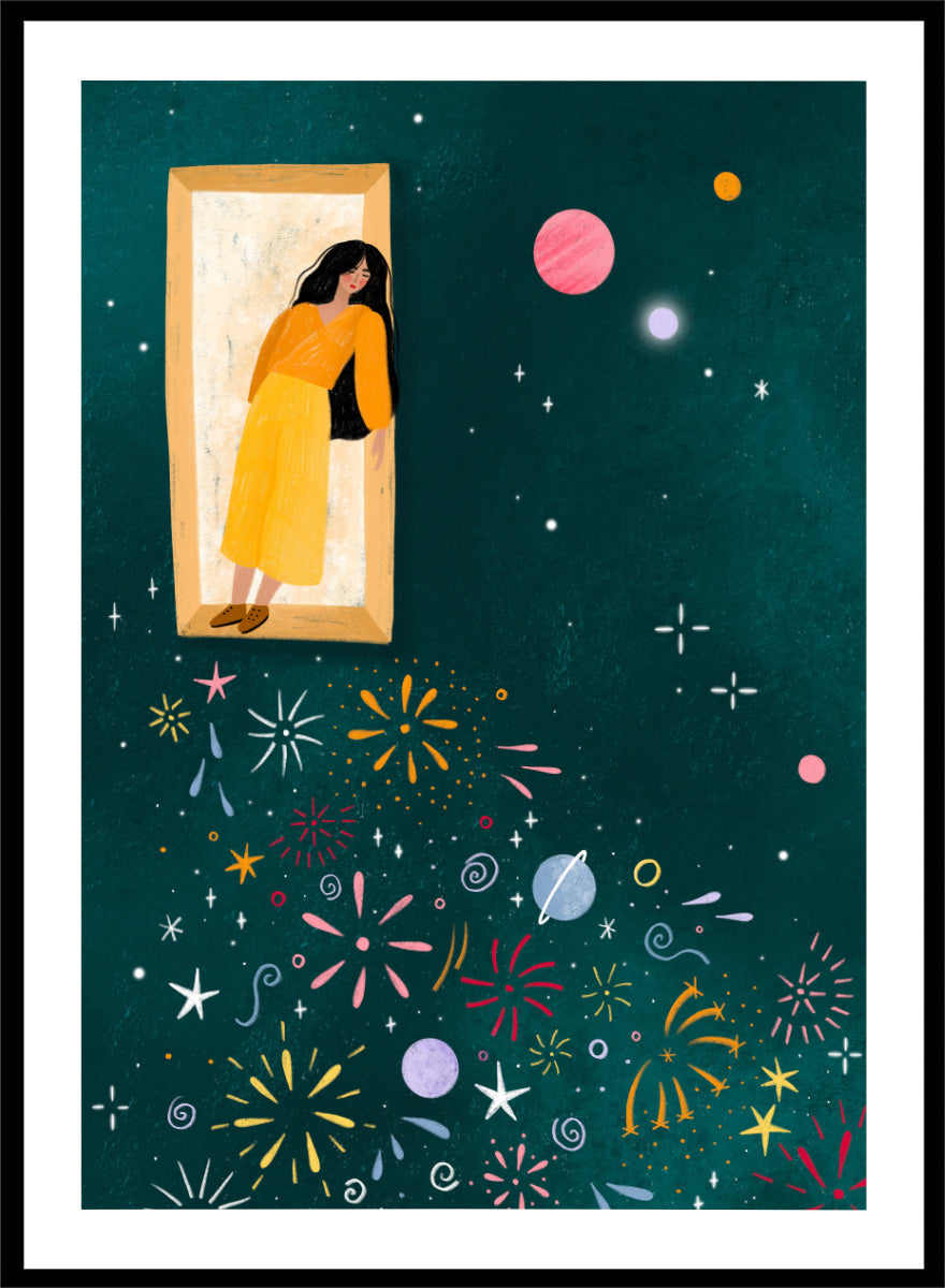 A framed art print featuring a whimsical illustration of a woman in a yellow dress standing in a mirror, with her reflection spreading colorful fireworks and space-themed motifs like planets and stars across a dark teal background. Shop Girl and Cosmic Fireworks by Bea Müller, a figurative wall art print poster featuring a woman, planets, stars, and colorful cosmic fireworks in deep green tones.