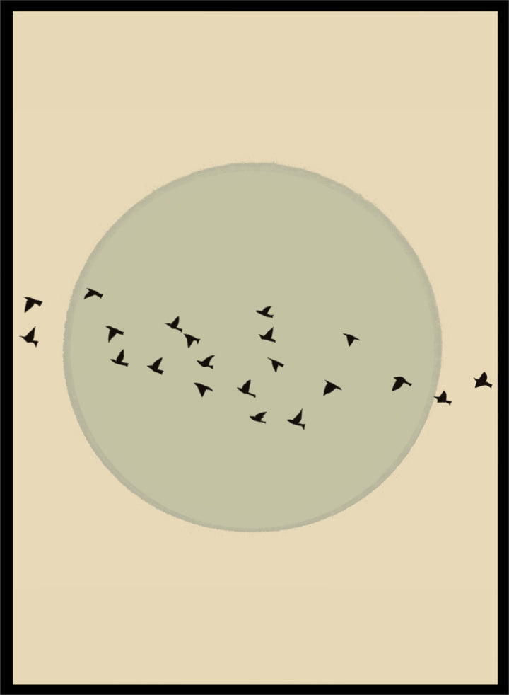 Minimalist art print featuring a large muted sage green circle centered on a warm beige background, with small black bird silhouettes flying around it. Flock Against The Moon by The Art Concept is a minimalist bird art print featuring black birds in flight across a pale green moon and warm cream background.