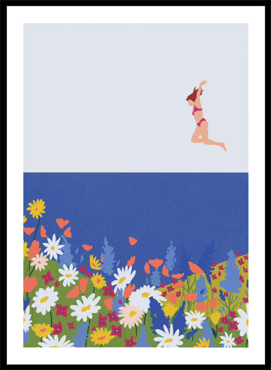A framed art print featuring a minimalist illustration of a woman in a pink bikini jumping into a blue sea with a colorful wildflower meadow below. Wildflower Summer Jump art print by Ceyda Alasar features a joyful figure above colorful blooms, bringing playful summer energy to your walls.