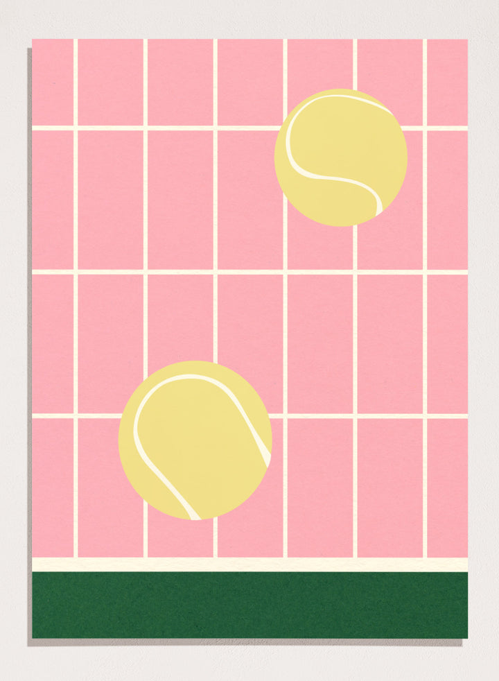 Two yellow tennis balls on a pink grid background with a green stripe at the bottom. Tennis Kitchen by Rosi Feist is a modern minimalist fine art print featuring oversized tennis balls on pink tile. Officially licensed wall poster with optional artisan framing.