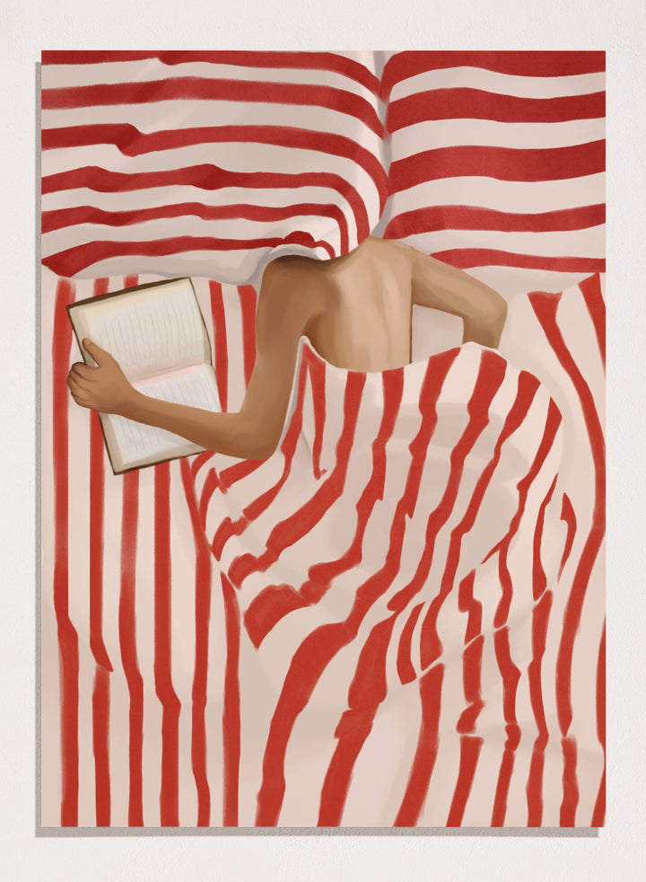 Between the Lines by Flow Line art print shows a woman reading in bed wrapped in red striped bedding. A modern lifestyle wall poster inspired by slow evenings.