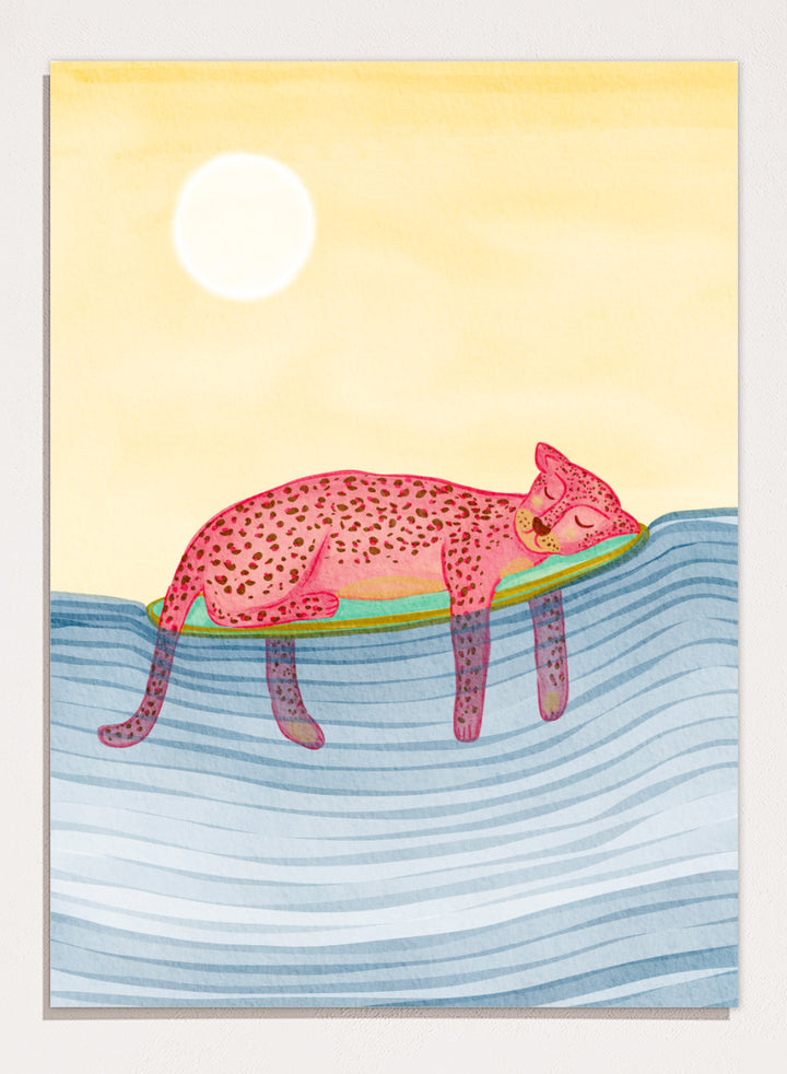 Shop Dreamy Leopard Float by Nikita Jariwala, a playful animal wall art print poster featuring a pink leopard relaxing on a pool float in blue water.