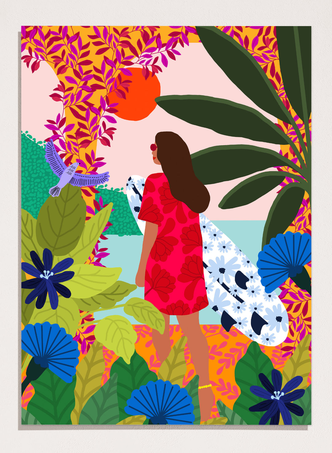 Woman in a red dress with a white surfboard amidst tropical foliage and flowers. Going Surfing by Rafaela Mascaro is a colorful tropical art print featuring a surfer, lush botanicals, vibrant florals, and sunny coastal inspiration.