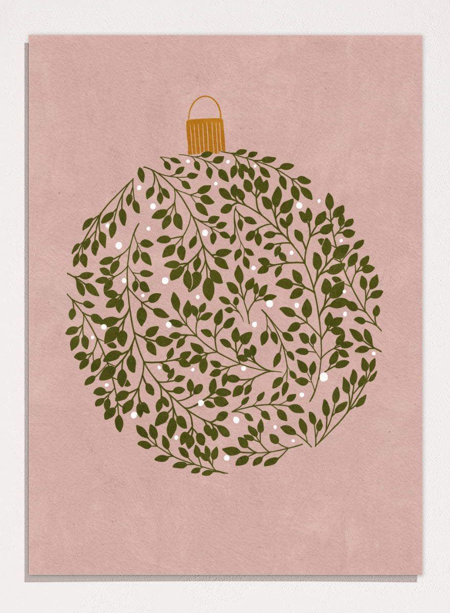 Shop Round Ornament by Katie O’Shea, a botanical Christmas wall art print poster featuring green leaves, white glowing light details, and a dusty pink background.