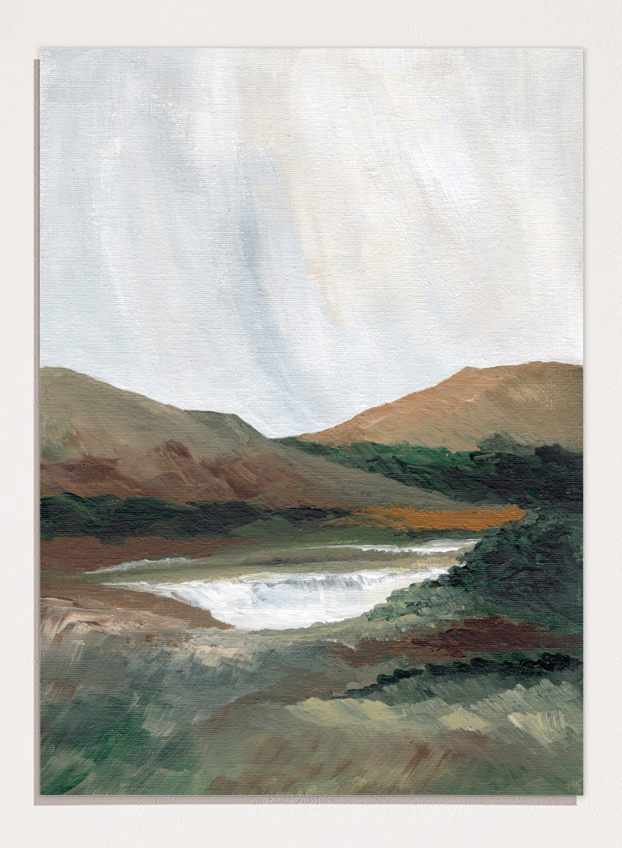 An impressionistic landscape painting of a river or waterfall flowing through a valley, with brown and green hills under a pale sky. Shop Serene Mountain Lake by Nikita Jariwala, a mountain landscape wall art print poster featuring a peaceful lake, wooded hills, and soft green tones.