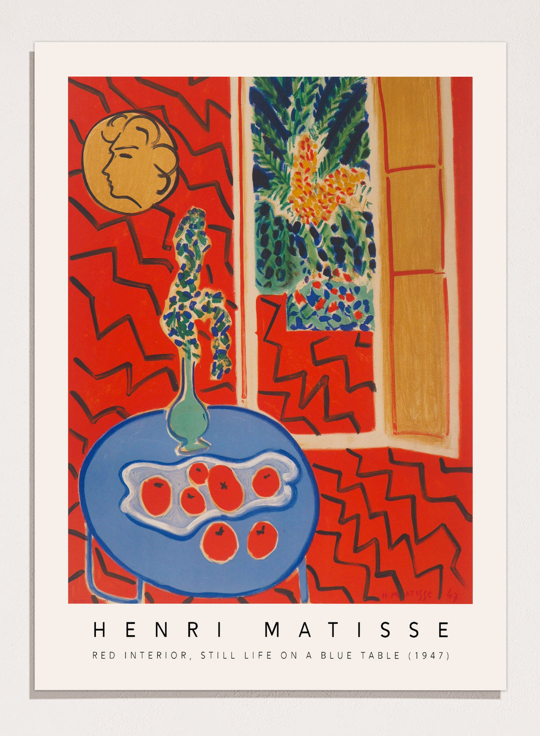 Artistic depiction of a still life scene with a blue table, vase, and fruit, by Henri Matisse. Red Interior, Still Life on a Blue Table by Henri Matisse is a 1947 modern art print featuring bold color, expressive interiors, floral still life details, and iconic French design.
