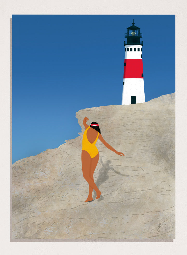 Woman in a yellow swimsuit standing on a rocky outcrop with a lighthouse in the background. My Beach by Jota de Jai is a modern coastal wall art print featuring a woman in a yellow swimsuit and a lighthouse. Officially licensed fine art poster with optional wood frame.