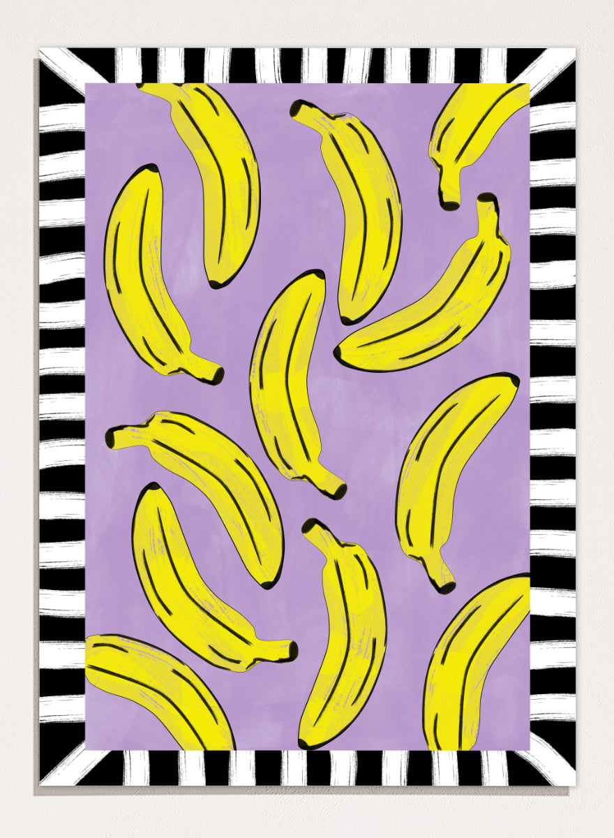 Shop Playful Banana Scatter by Elena Ristova, a banana wall art print poster in yellow, purple, black, and white with a bold striped border.