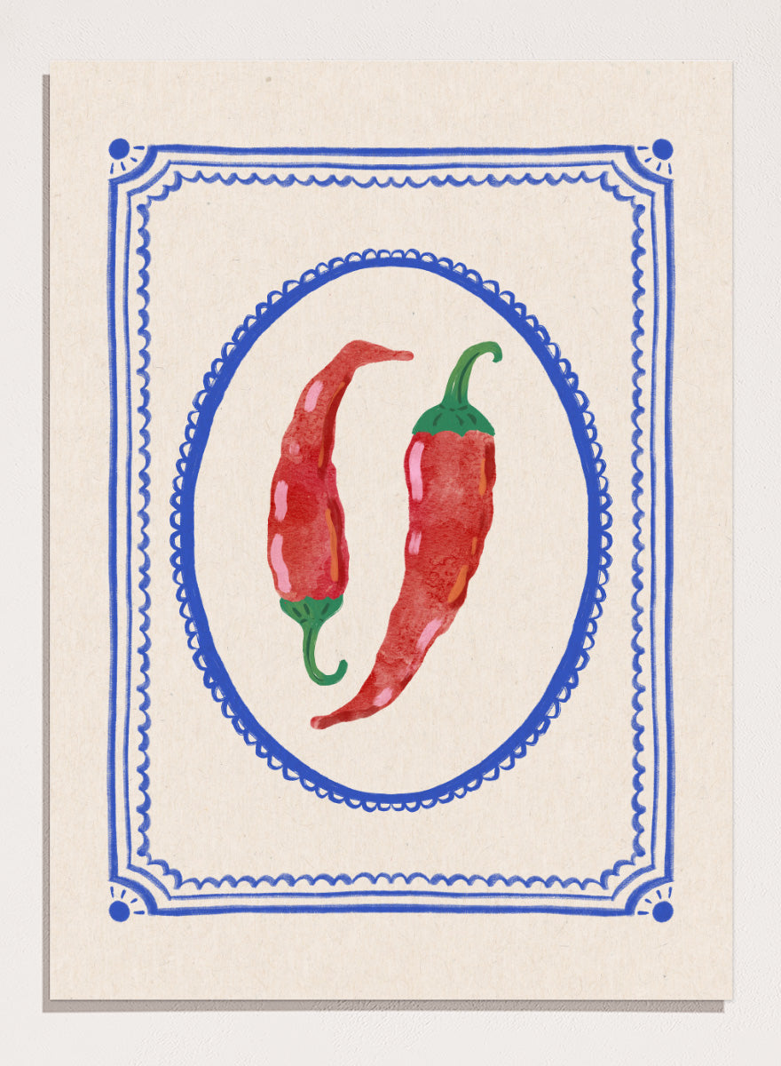 Spicy Chili Peppers by Katarzyna Gąsiorowska kitchen art print featuring red chilies in an ornate cobalt frame with vintage Mediterranean style.