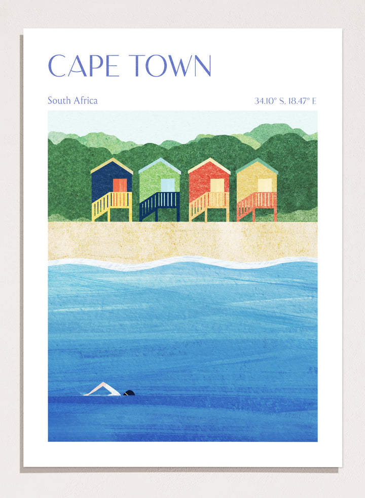 Illustration of beach huts by the sea with 'Cape Town, South Africa' text. Cape Town Beach Huts by Longwayhome is a minimalist coastal art print featuring colorful beach cabins, ocean scenery, and modern travel inspired design.