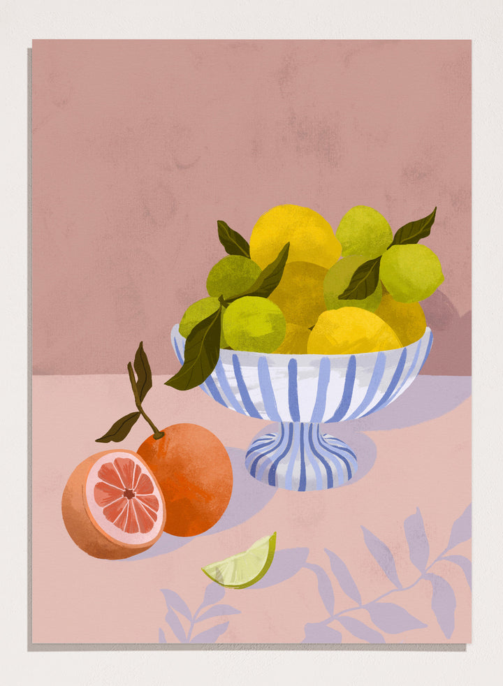 Illustration of a bowl with lemons and limes on a pink background. Bittersweet by Goed Blauw is a still life art print and wall poster with lemons, limes, and grapefruit in a striped bowl on a soft pink background.