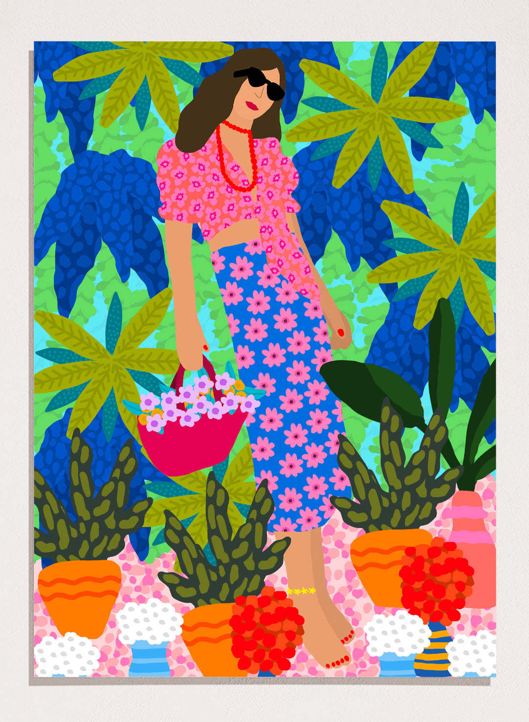Woman in a floral dress holding a basket of flowers amidst colorful plants. Walking Between Gardens by Rafaela Mascaro fine art print poster featuring woman carrying flowers in lush tropical garden, modern contemporary botanical wall art.