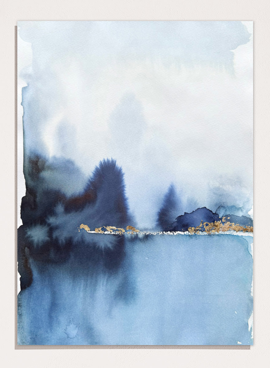 Shop Golden Horizon Blue Landscape by Helena Ryhle, a watercolor landscape wall art print poster with misty blue scenery and a striking gold horizon.