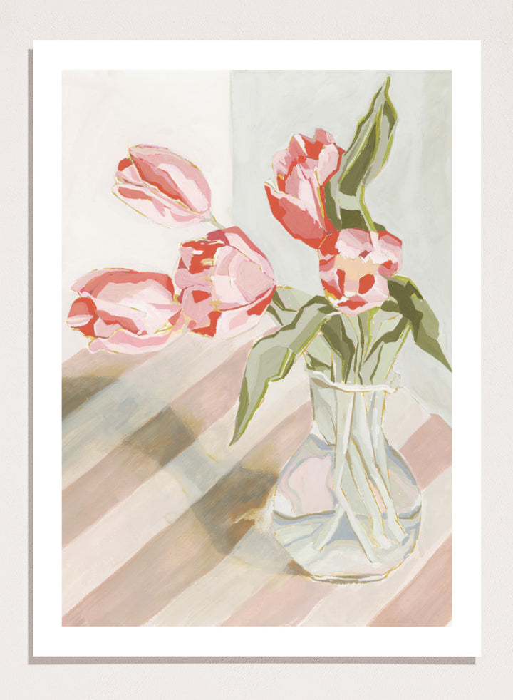 Artistic depiction of pink tulips in a clear vase on a striped background. Tulips in a Vase by Lucrecia Caporale is an officially licensed still life art print featuring pink tulips in a glass vase. Available framed or unframed.