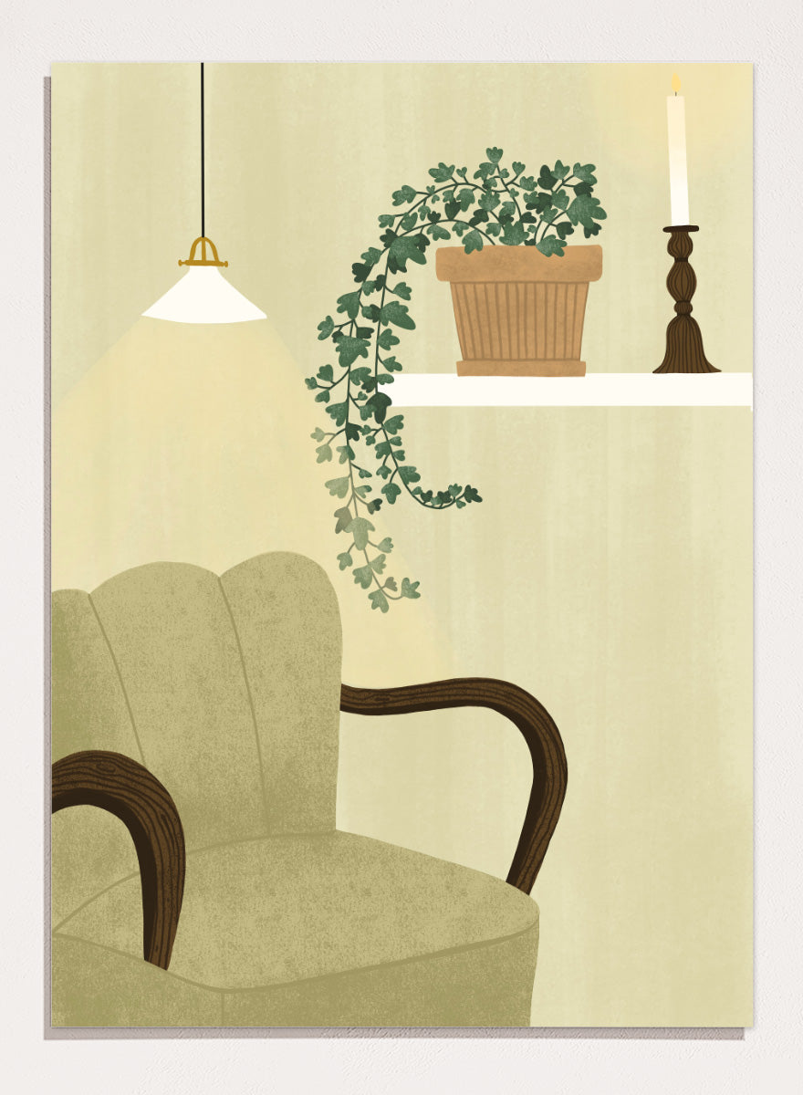A framed art print featuring a cozy interior scene with a beige armchair, a hanging pendant light, a shelf with a potted trailing green plant and a candlestick, and a cream-colored wall background. Shop Cozy Indoor Retreat by Elsa Nätterdal, a modern interior art print featuring a cozy armchair, trailing houseplant, candlelight, and warm neutral tones.