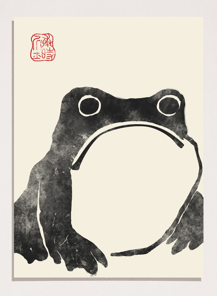 Inspired by Matsumoto Hoji 松本奉時 woodblock frog illustration, this Japanese poster art print showcases illustration of angry toad against beige background. Featuring a abstract black and beige frog drawing, this Japani vintage exhibition poster by Matsumoto Hoji is perfect for any boho, retro, minimalist, or Japani space.