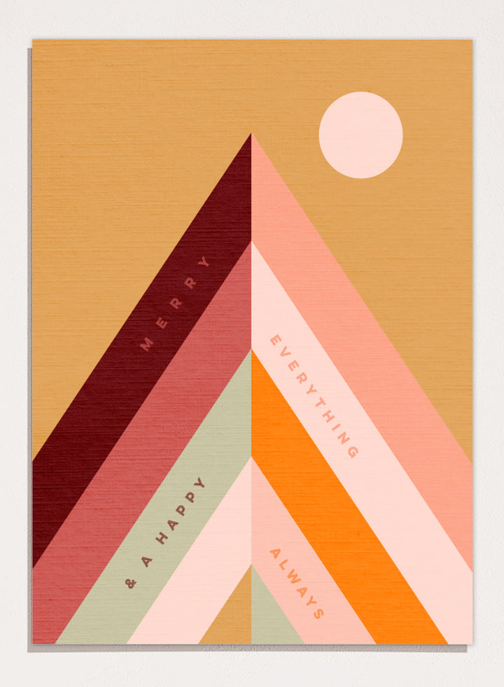 Shop Merry Everything Mountains by Dominique Vari, a retro holiday wall art print poster featuring colorful geometric mountains, cheerful typography, and warm festive tones.