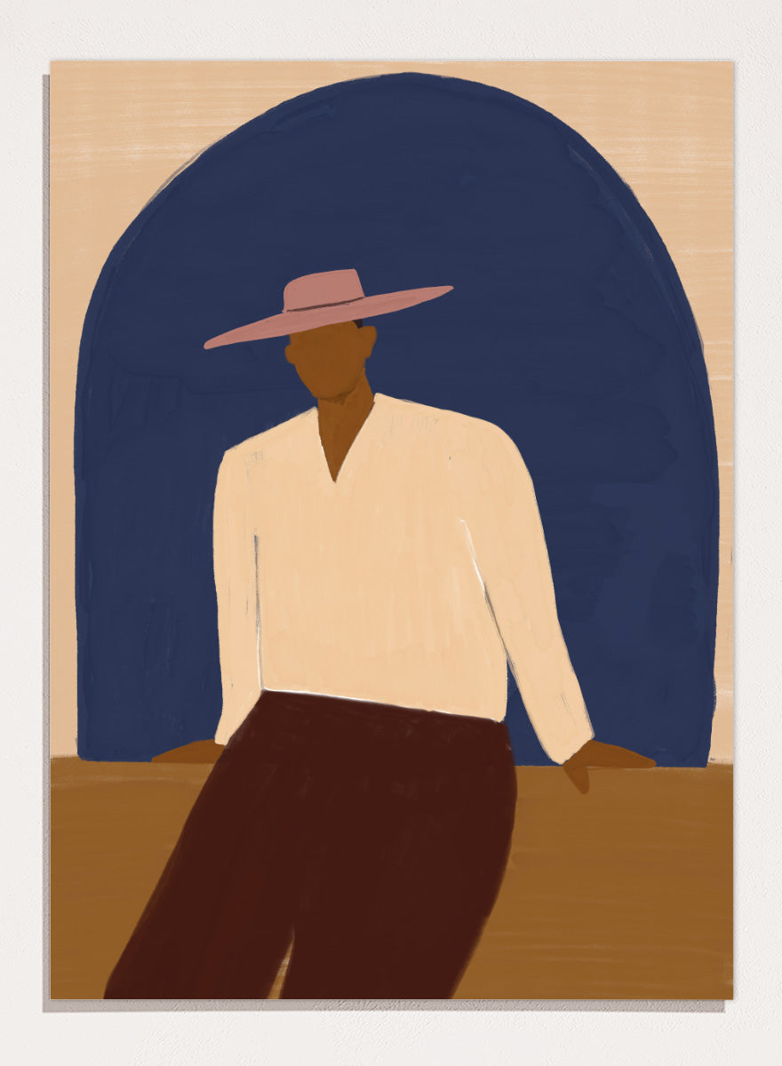 A stylized art print depicting a seated figure in a wide-brimmed pink hat, cream shirt, and dark brown trousers against a large dark blue arch on a beige background. Man In Blue Arch by The Art Concept portrait art print featuring a lone figure beneath a deep blue arch in warm earthy tones.
