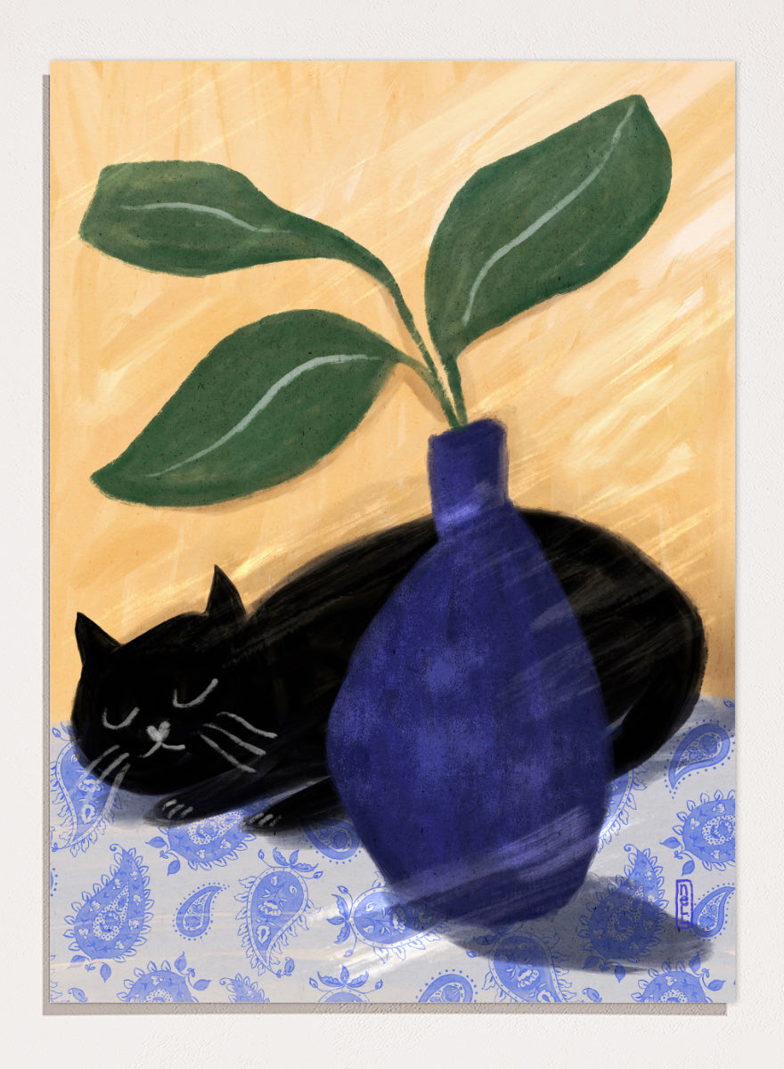 A stylized still life painting featuring a black cat lying on a blue-and-white patterned surface beside a dark blue vase with green leaves, against a warm beige background. Shop the Sleeping Black Cat art print by Dirkie Nell, featuring a curled black cat, bold cobalt blue vase, green leaves and playful patterned details.