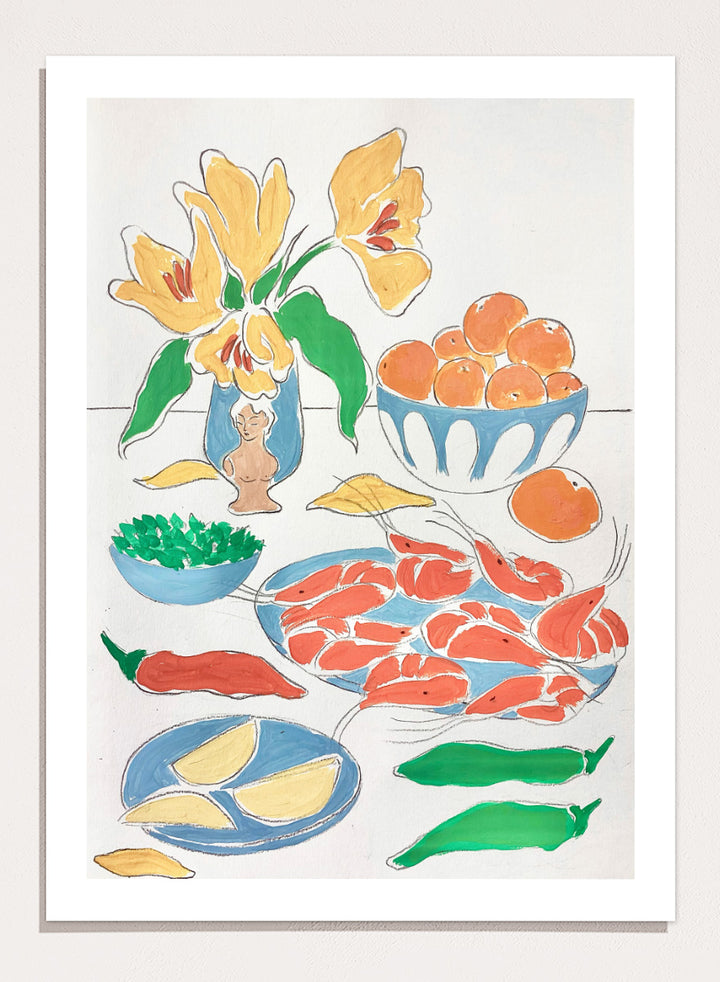 A framed still life art print featuring yellow tulips in a blue vase, bowls of oranges, red shrimp, green peppers, and yellow lemon wedges. Shop Fresh Flowers and Feast by Rushati Chowdhury, a colorful food and floral art print featuring shrimp, oranges, peppers, greens, lemon, and yellow flowers.