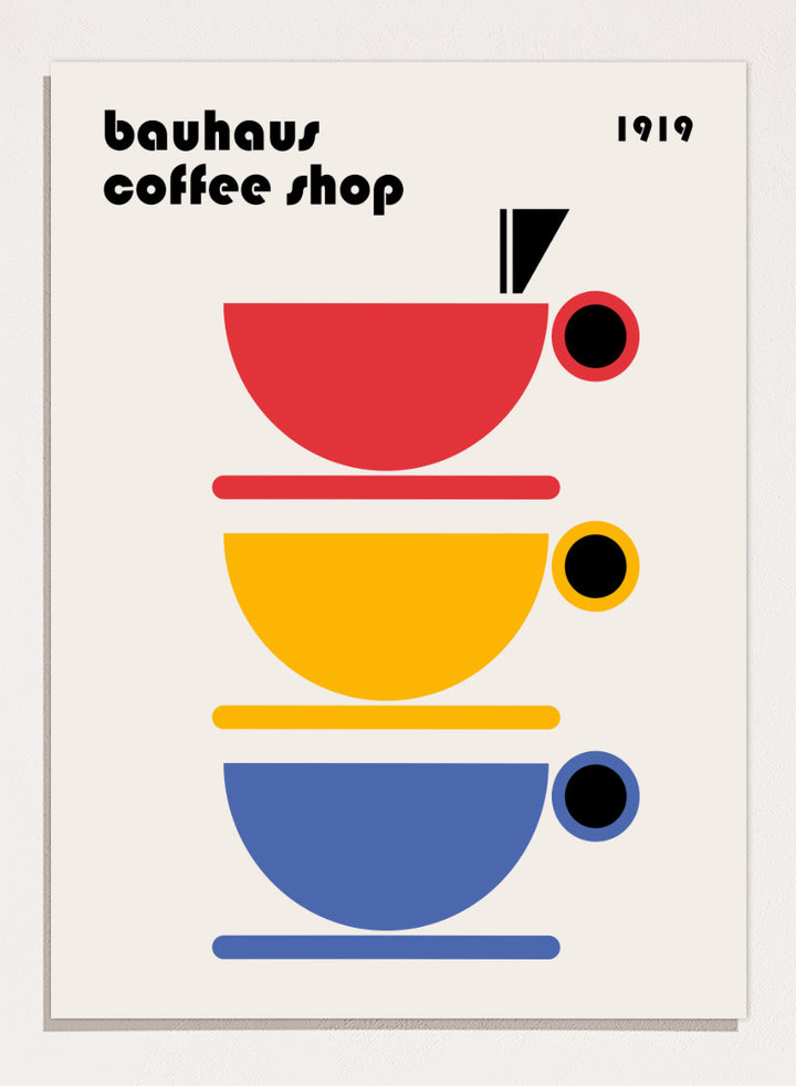 Bauhaus Coffee Cups by Retrodrome kitchen art print featuring stacked red, yellow, and blue coffee cups with bold Bauhaus-inspired design.