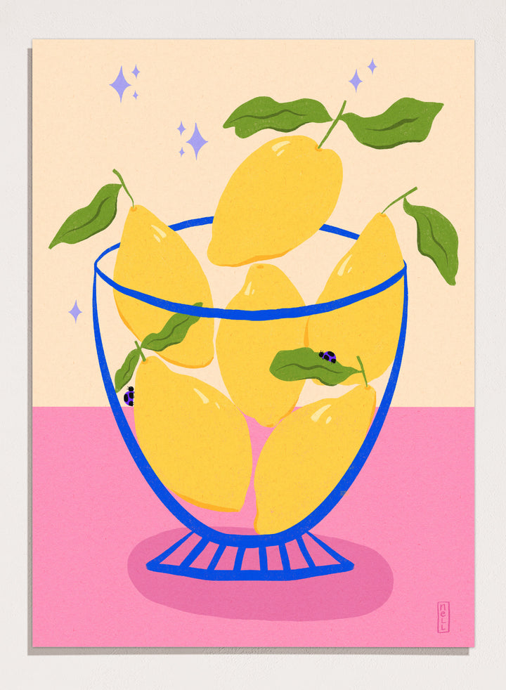 Illustration of lemons in a glass bowl with green leaves on a pink and beige background. Blue Floral Arrangement by Dirkie Nell is a botanical floral art print featuring deep blue flowers, folk inspired illustration, modern wall art, and expressive hand painted details.