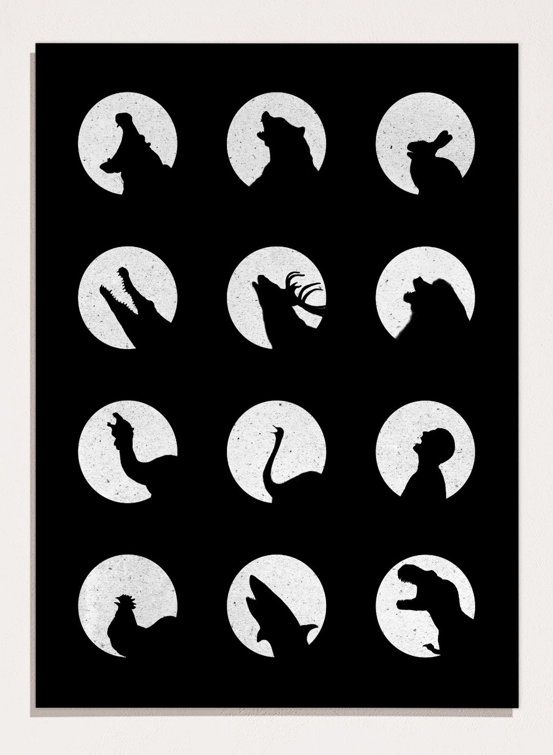 White silhouette of a dog howling at the moon pattern on a black background. Moonlit Wild Silhouettes by Florent Bodart is a minimalist animal silhouette art print with moon phases, a modern black wall poster with bold graphic design.