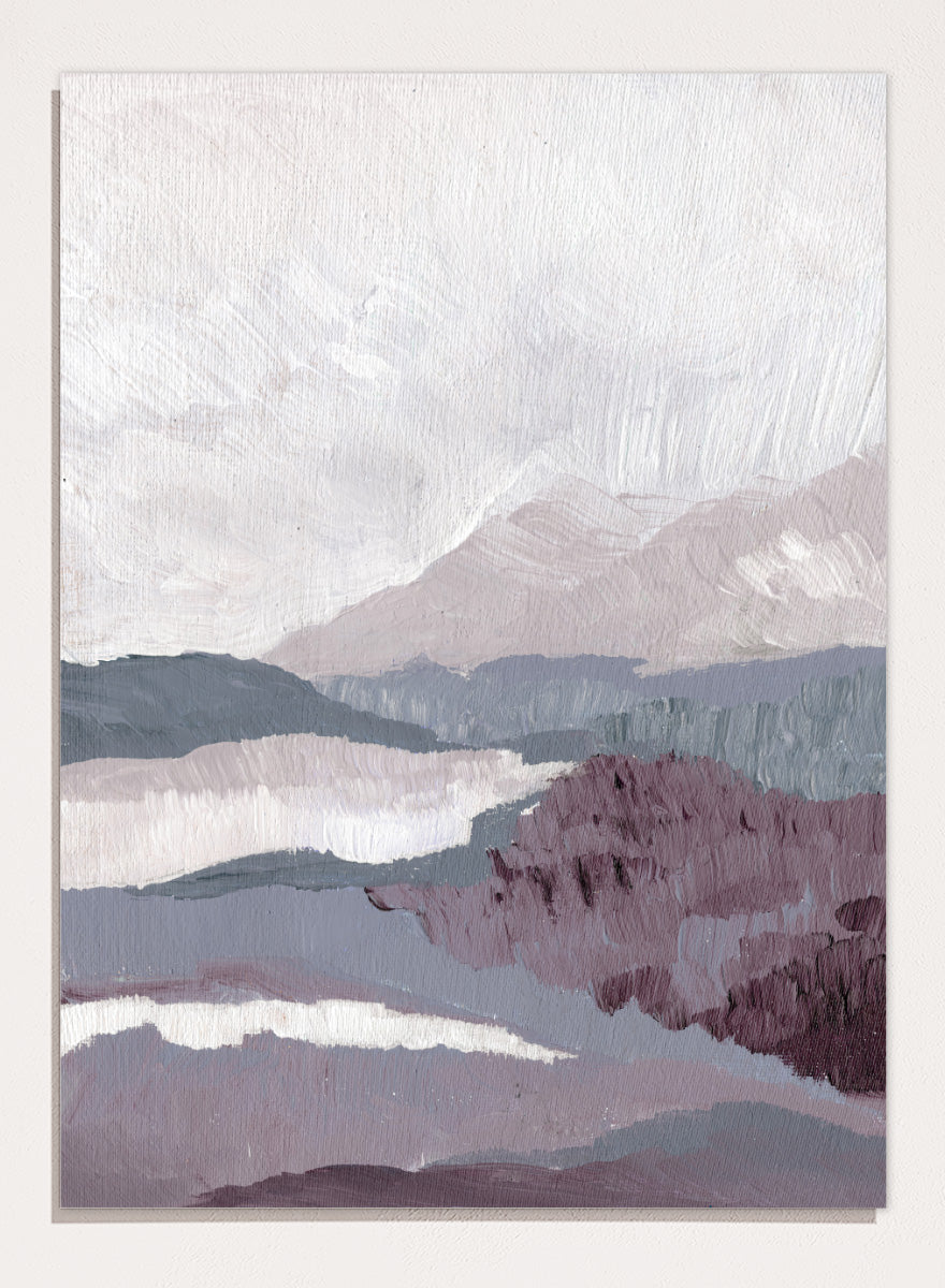 Shop Muted Mountain Layers by Nikita Jariwala, an abstract mountain landscape wall art print poster featuring layered peaks, misty scenery, and soft purple tones.