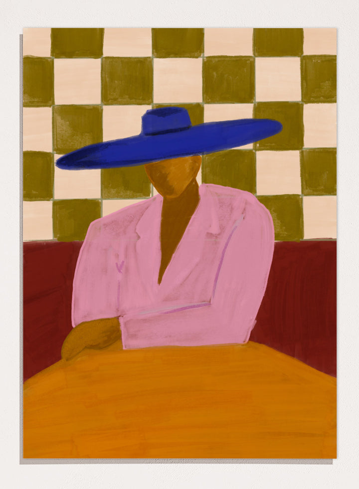 A stylized painting of a seated figure wearing a wide blue hat and pink top, with a red couch and a beige-and-olive checkered wall behind them. Blue Hat Chic by The Art Concept portrait art print featuring a cobalt blue hat, pink jacket, checkerboard backdrop, and bold modern color.