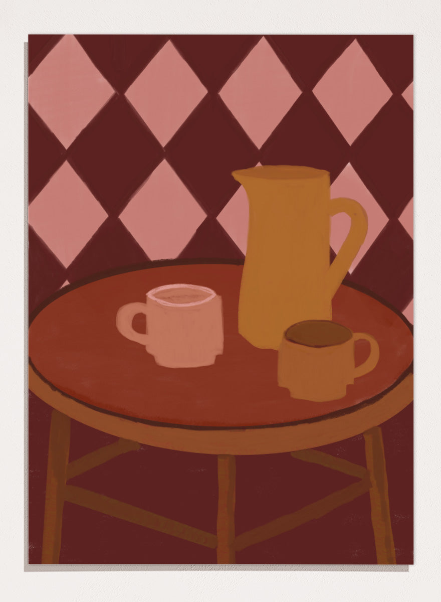 A stylized illustration of a round wooden table with a pink mug, a yellow pitcher, and a small cup against a dark red and pink diamond-patterned background. Retro Coffee Time by The Art Concept warm art print featuring mugs, a pitcher, and a café table in soft retro tones and a diamond pattern background.