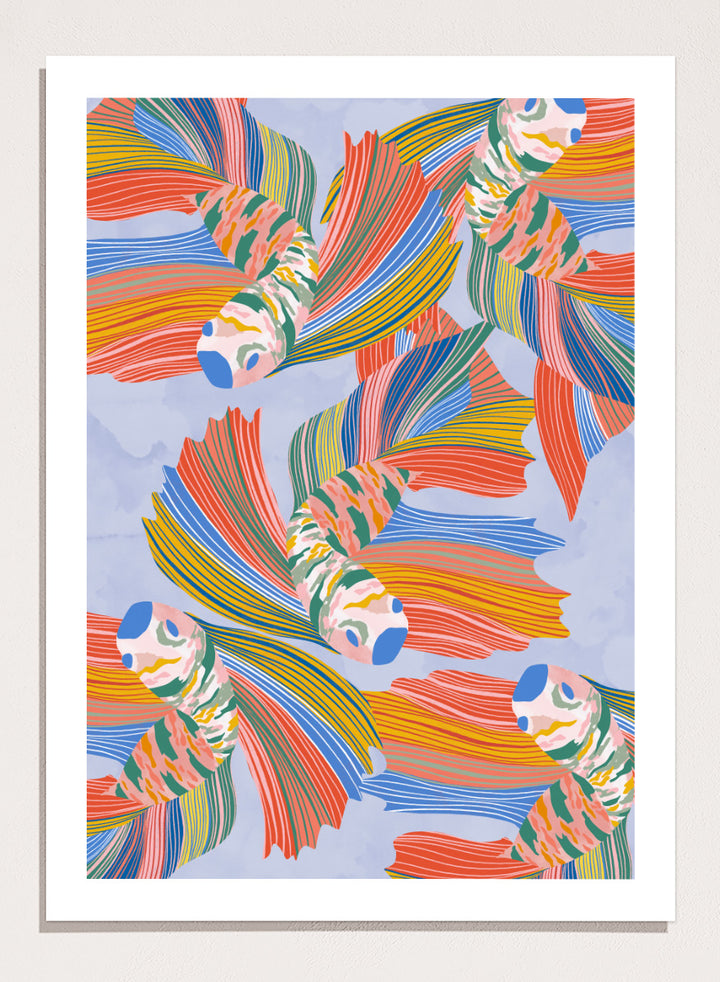 A framed art print featuring a colorful pattern of stylized fish with flowing striped fins in orange, yellow, green, blue, and red on a light blue background. Vibrant Swirling Fish Pattern by Ceyda Alasar art print featuring colorful flowing fish, striped fins, and playful aquatic movement on a soft blue background.