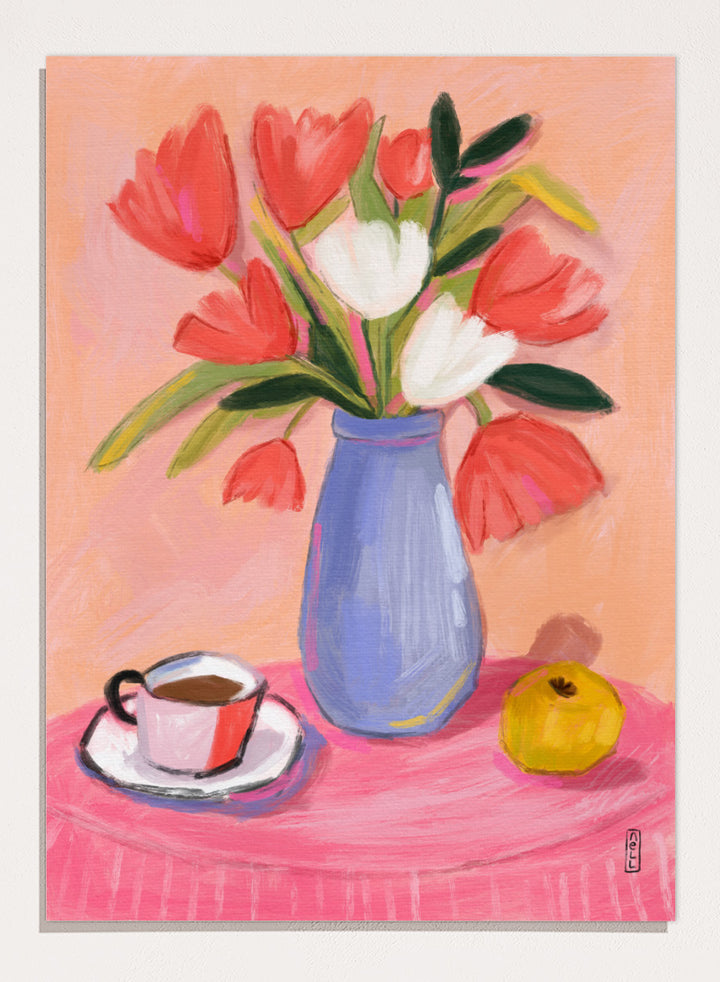 A still life painting of a bouquet of red and white tulips in a blue vase, set on a pink tablecloth next to a cup of coffee and a yellow fruit, against a peach background. Shop Fresh Tulips and Coffee by Dirkie Nell, a colorful floral still life art print featuring tulips, coffee, a blue vase, and warm pink and peach tones.