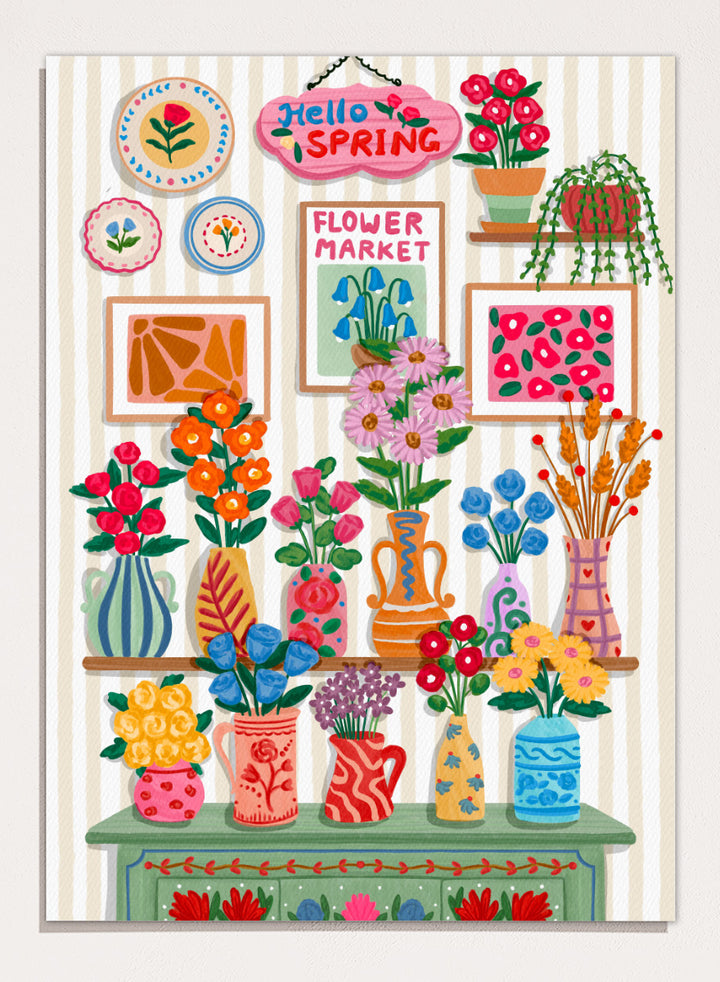 A colorful spring-themed floral wall display illustration featuring vases, framed art, hanging plants, and a sign reading &
